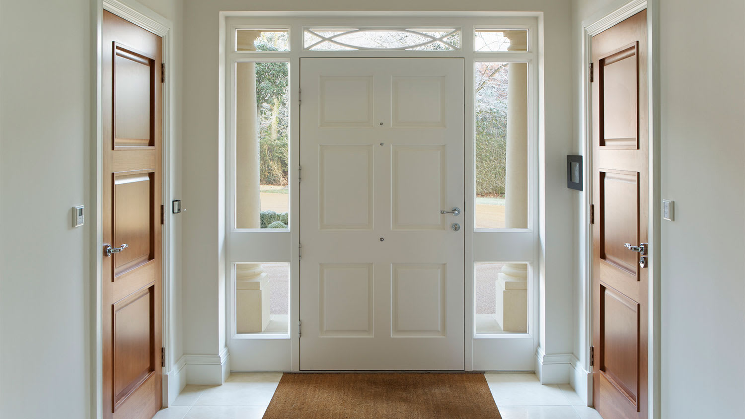Interior view of front door with glass panel