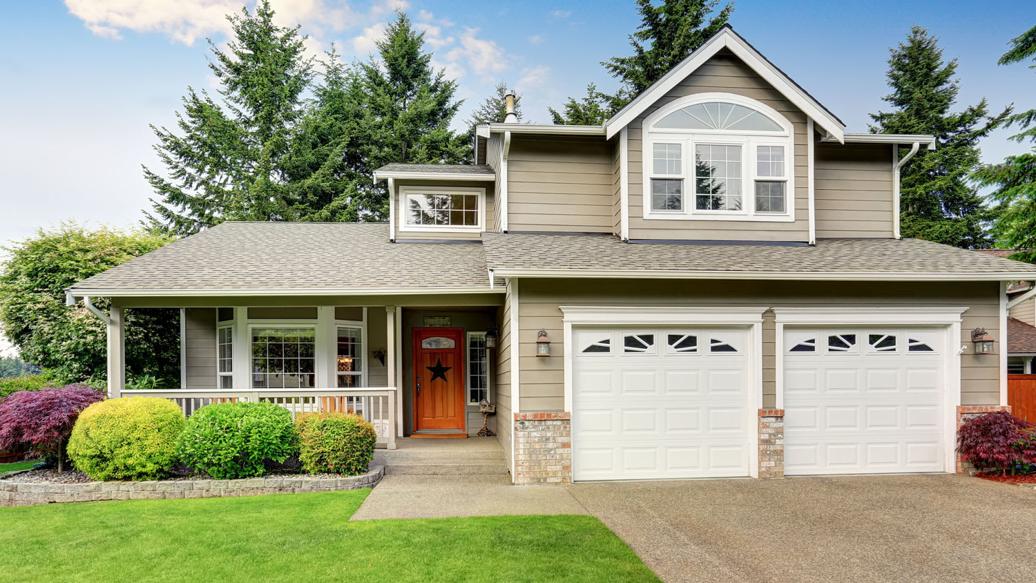 exterior of home with two garage doors