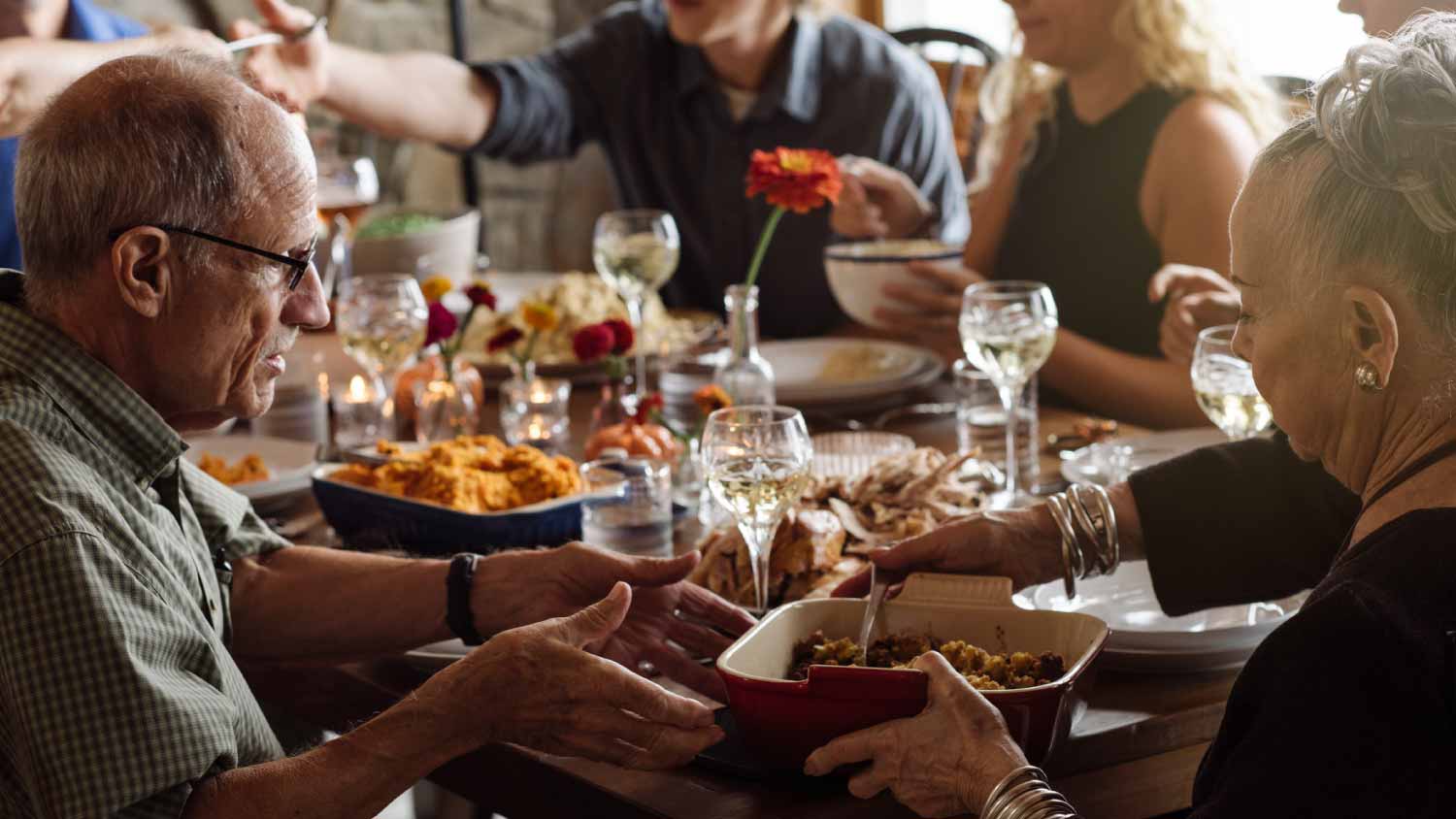Family sitting at Thanksgiving dinner