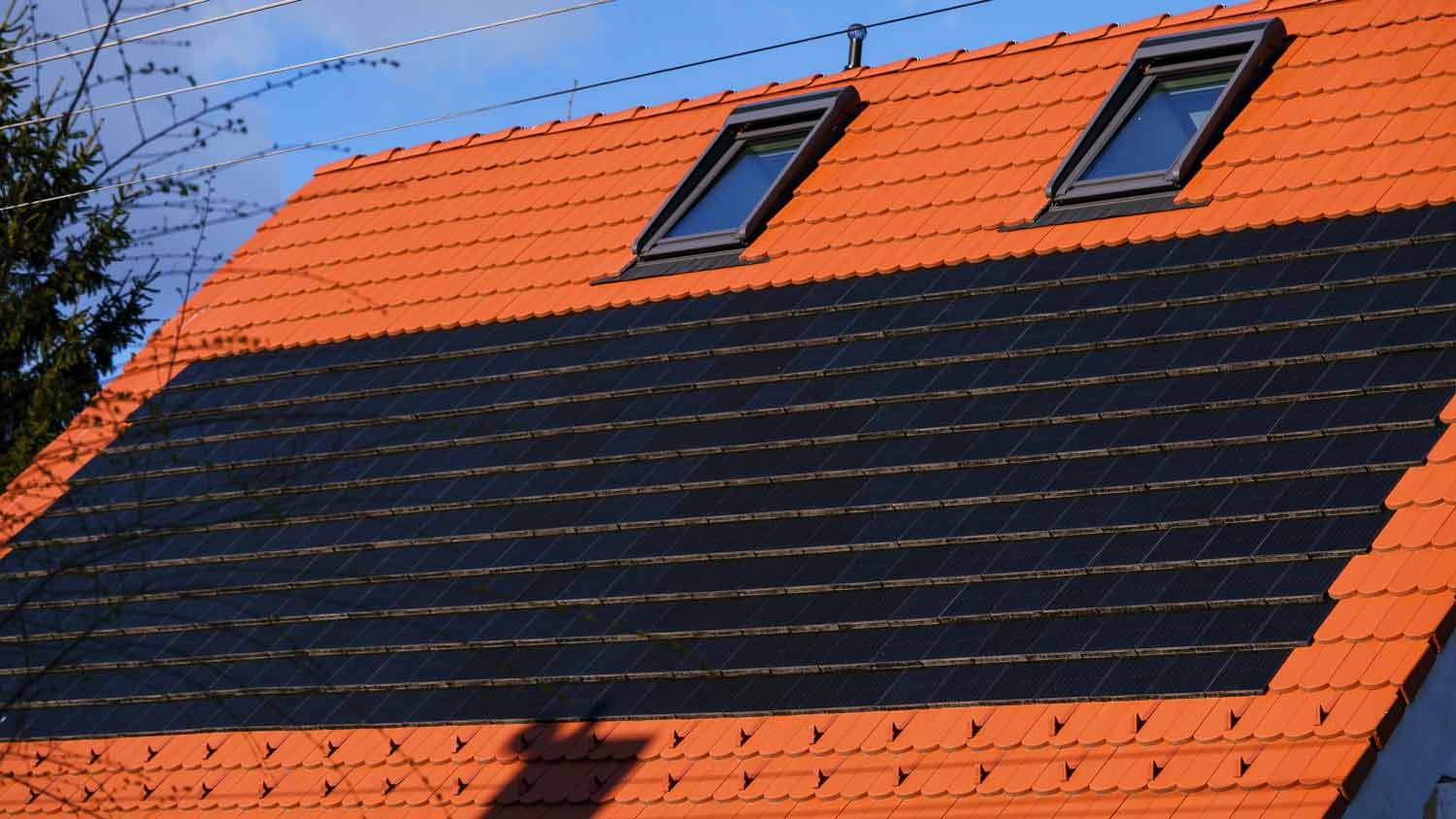 orange roof with solar shingles