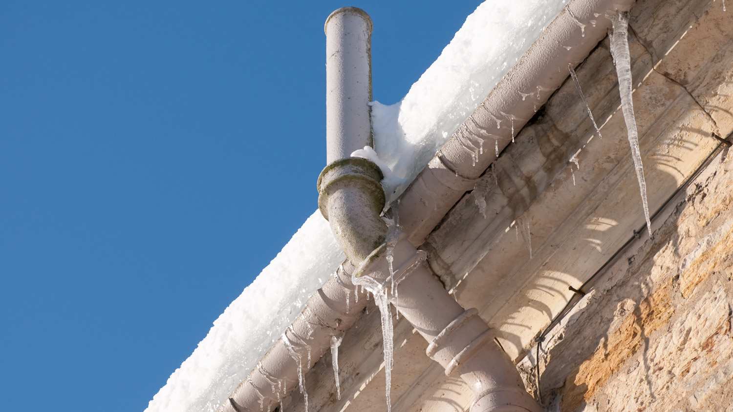 None Icicles hanging from the gutter