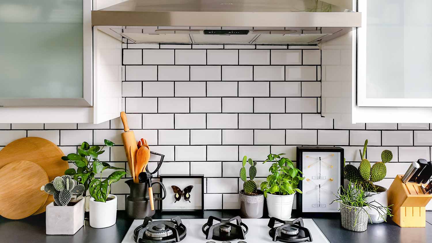 Black and white subway tiled kitchen