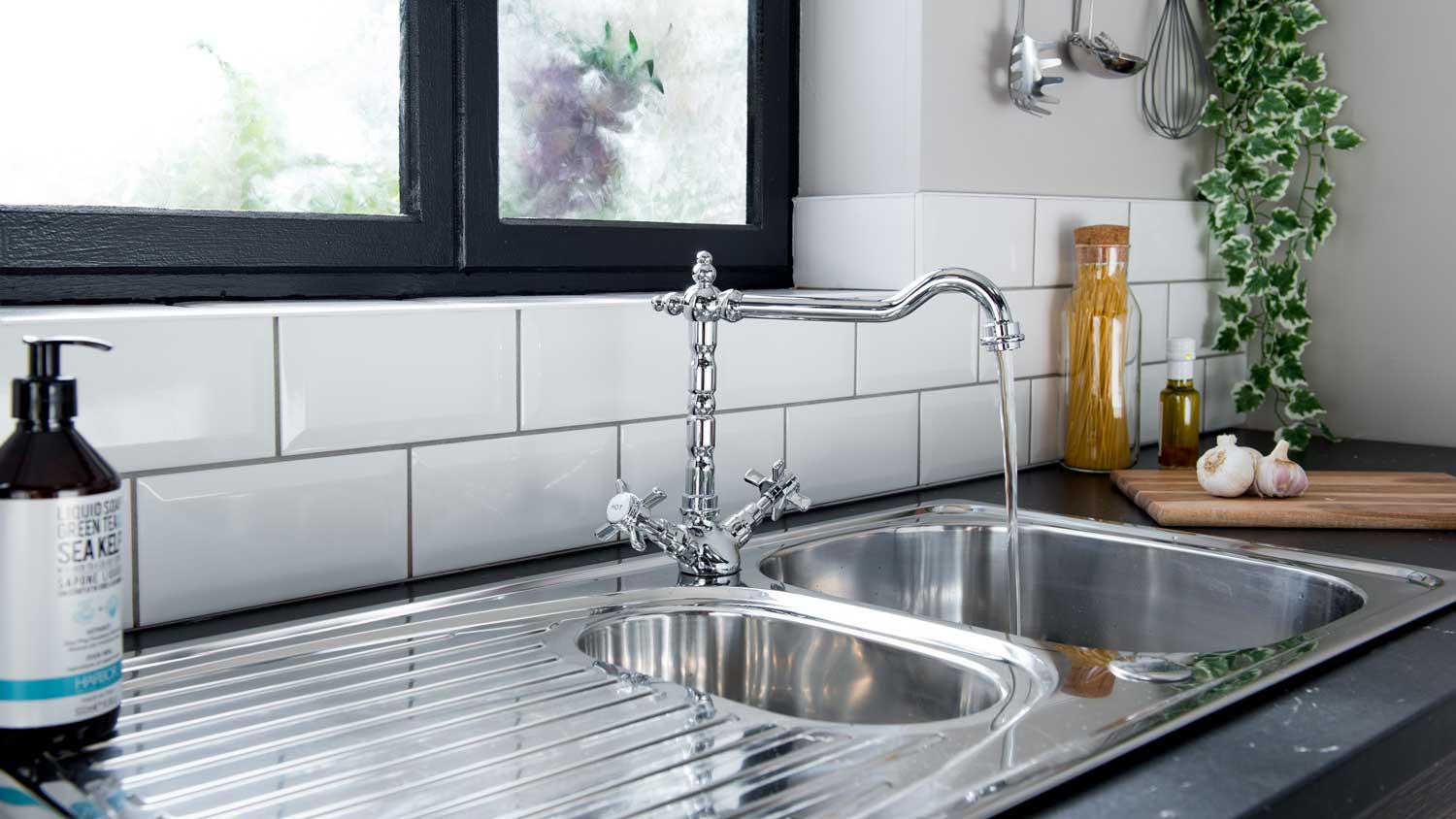 modern kitchen sink running water