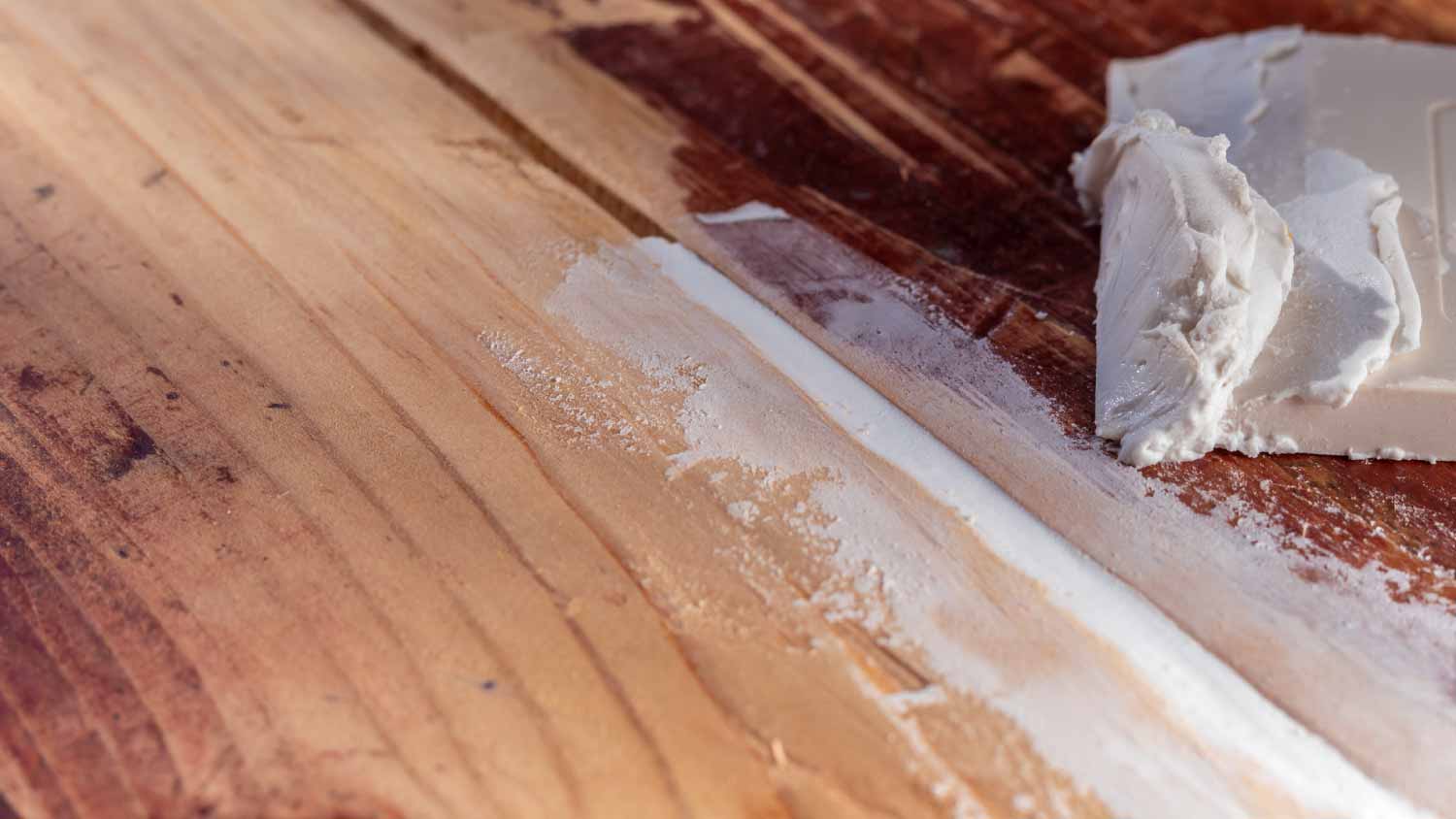 None Sealing cracks in old table