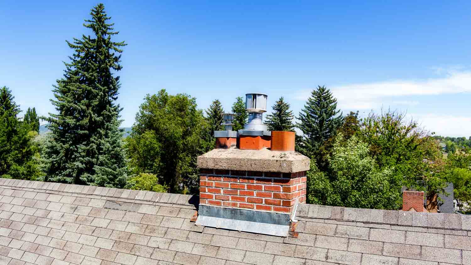 Chimney roof with shingles