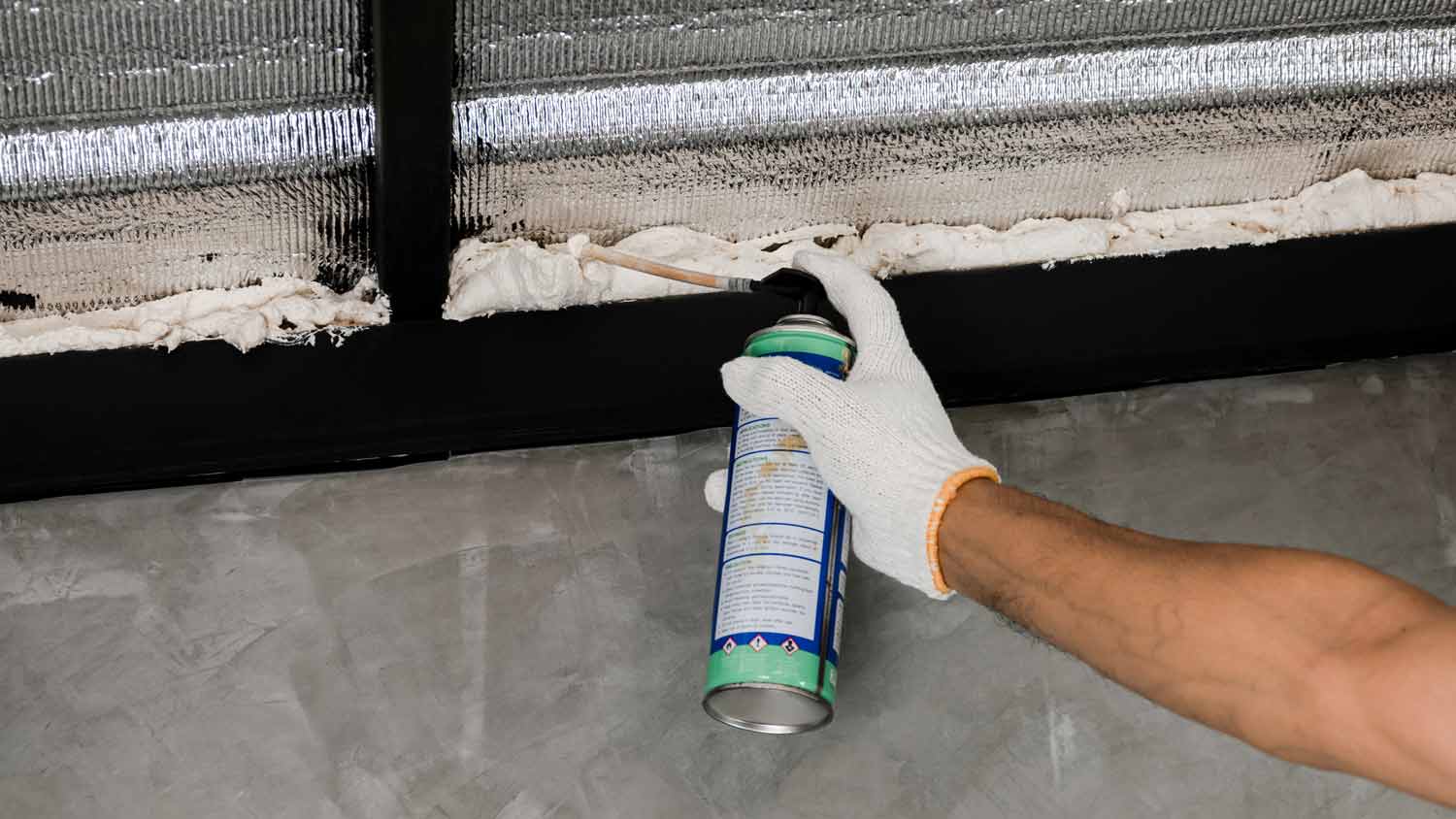 None man using spray foam sealant
