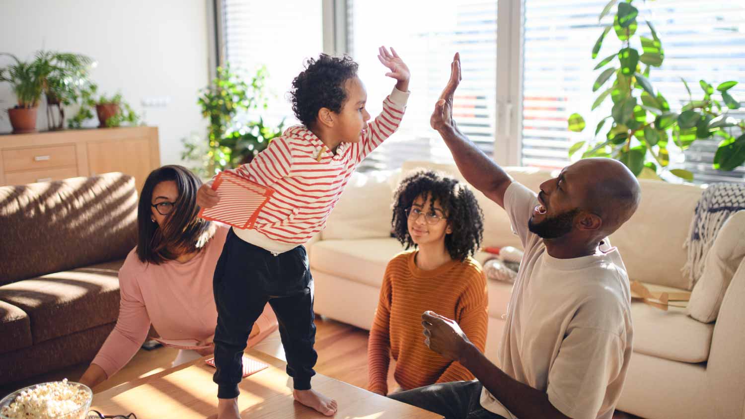 Family having fun in the living room