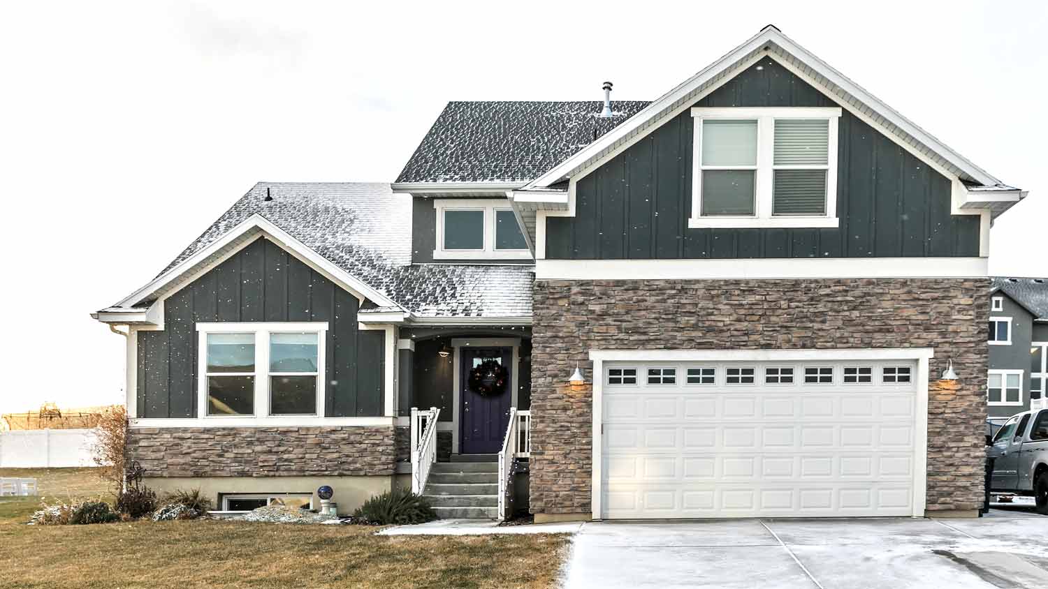 grey house on a snowy day