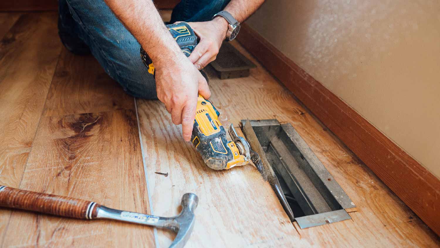 None A person replacing ductwork