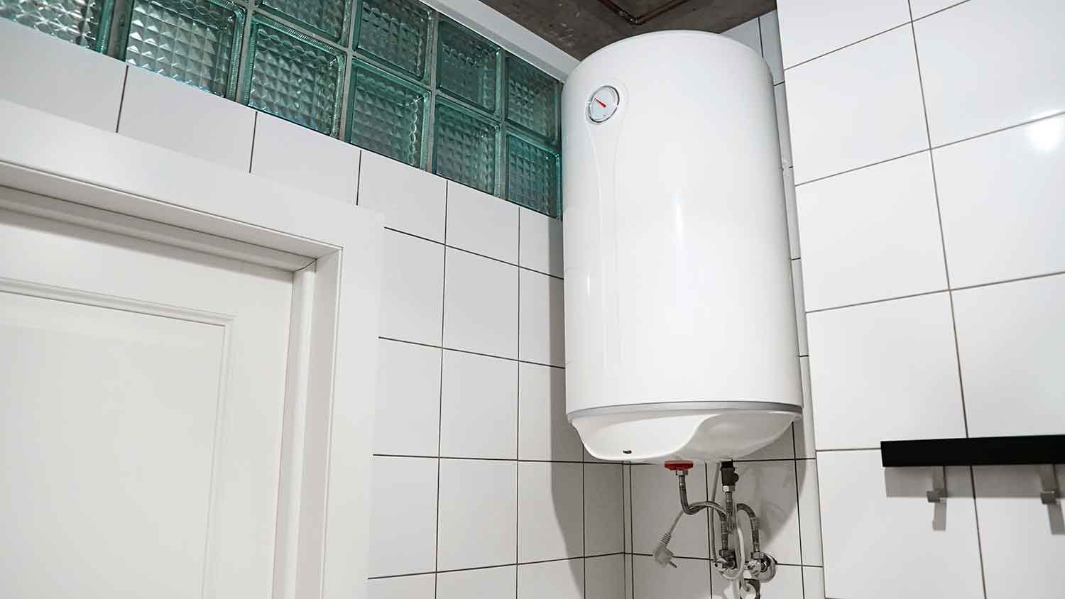 Electric water heater installed in the bathroom