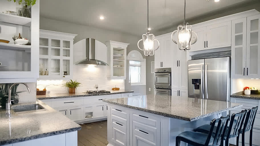 Illinois kitchen according to AI, with modern Contemporary style white cabinets, stainless steel appliances, and elegant modern light fixtures