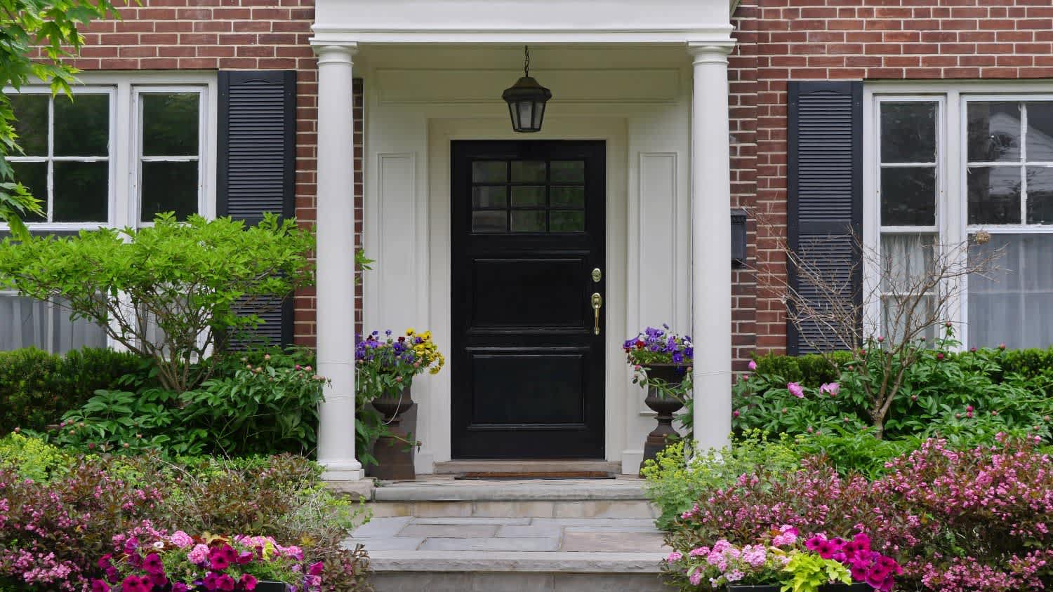 None Front door of house with portico entrance