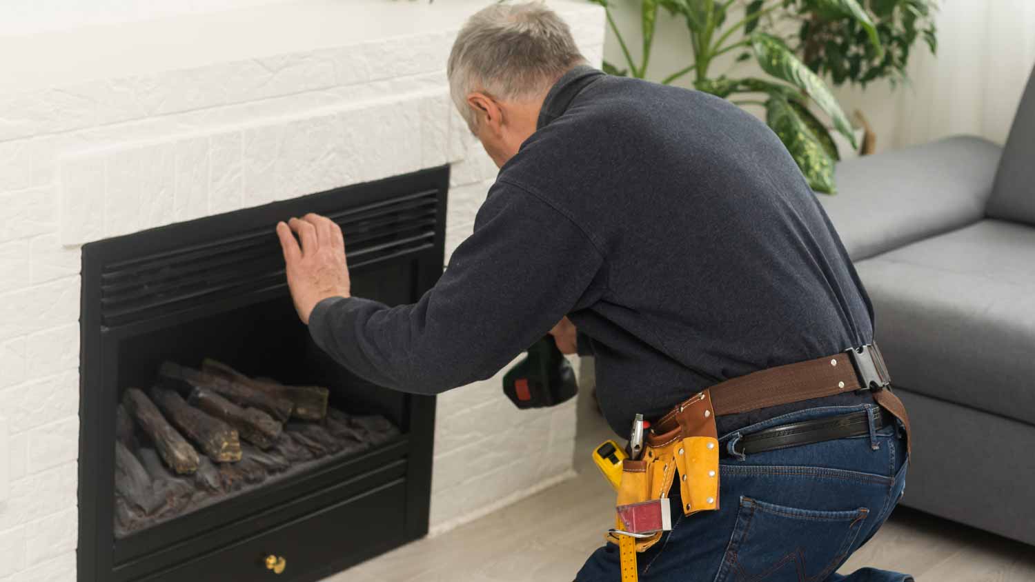 None Worker checking fireplace