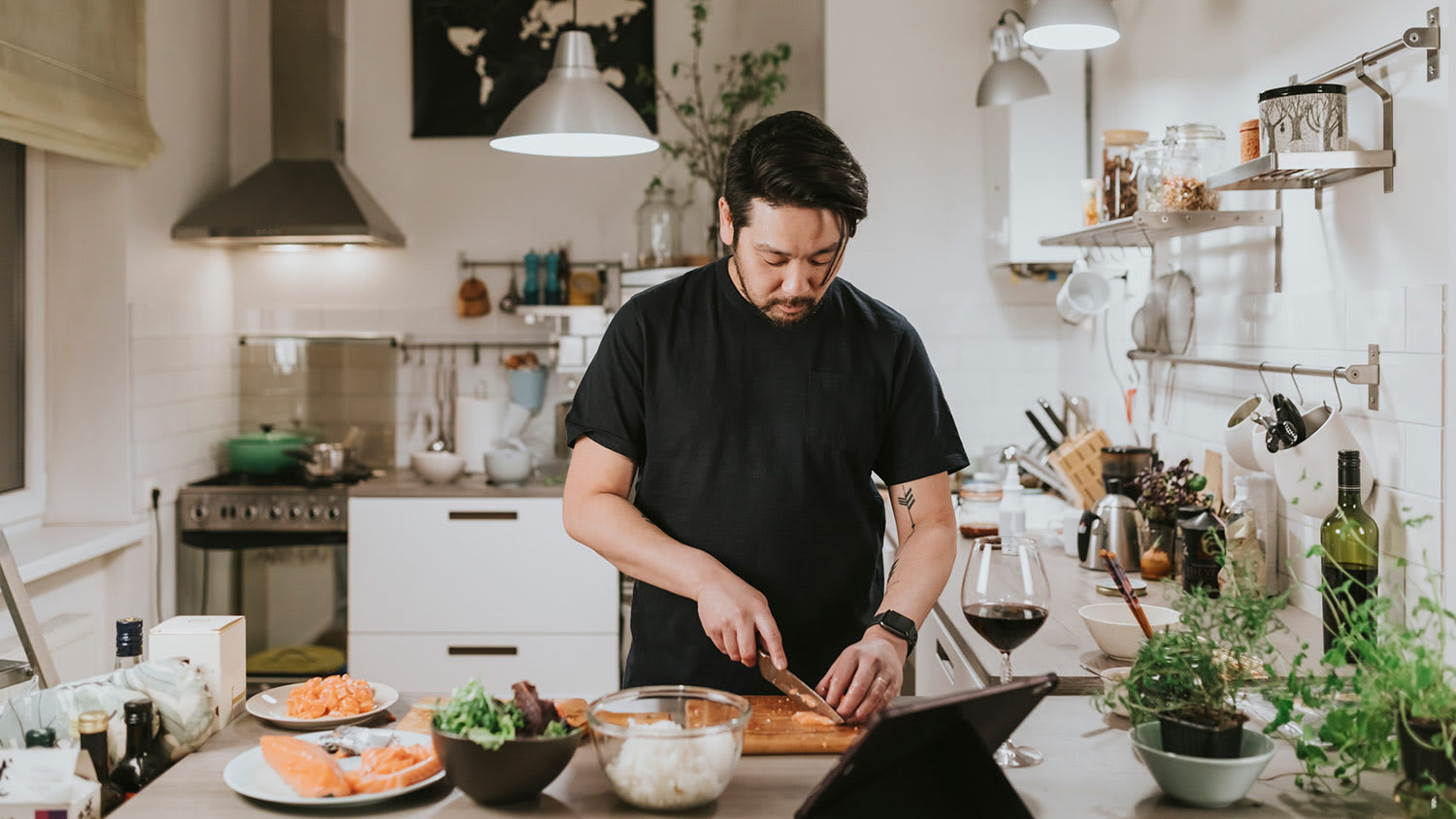 Man cooking in kitchen with lighting