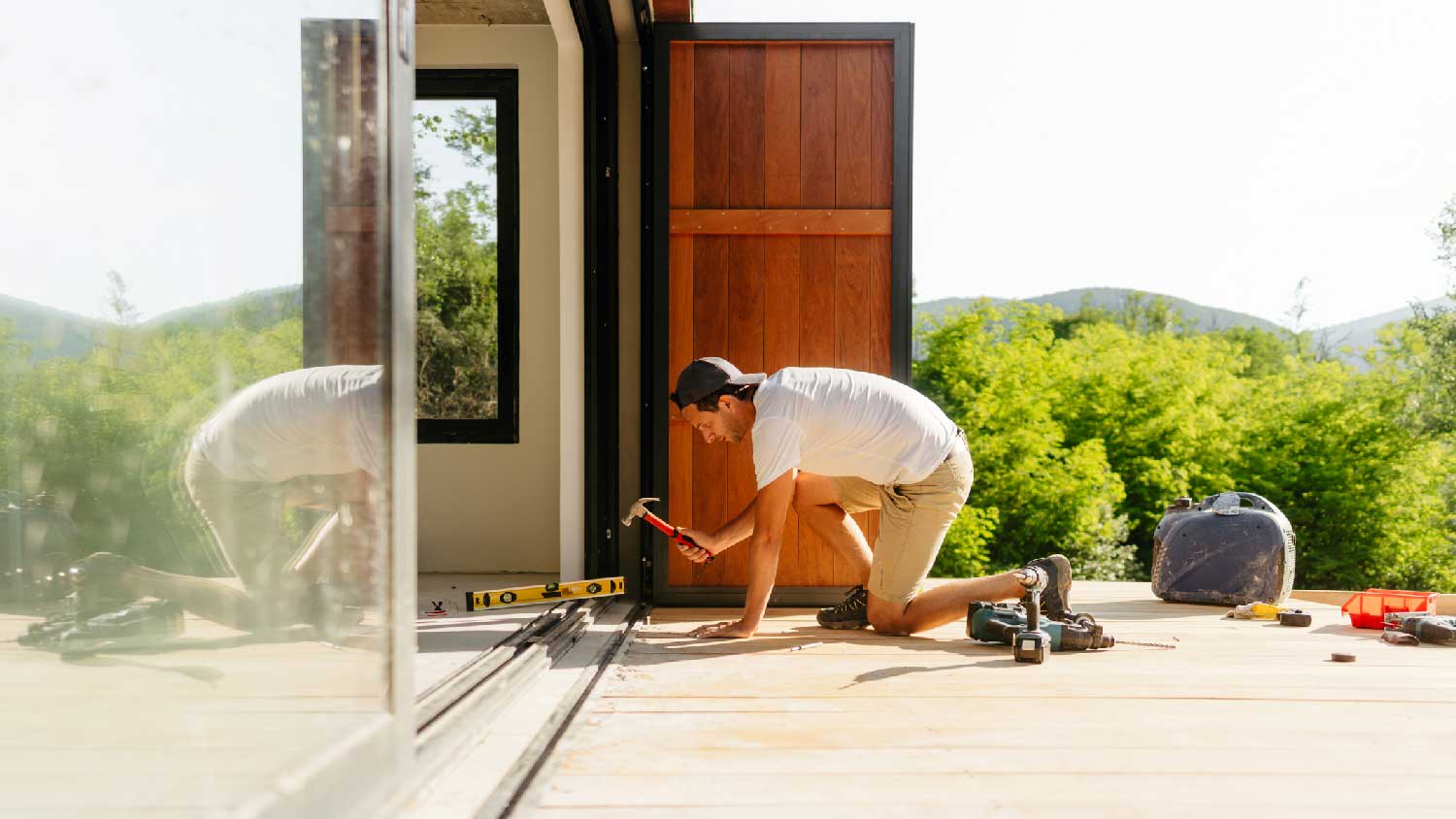 A man working on a home addition