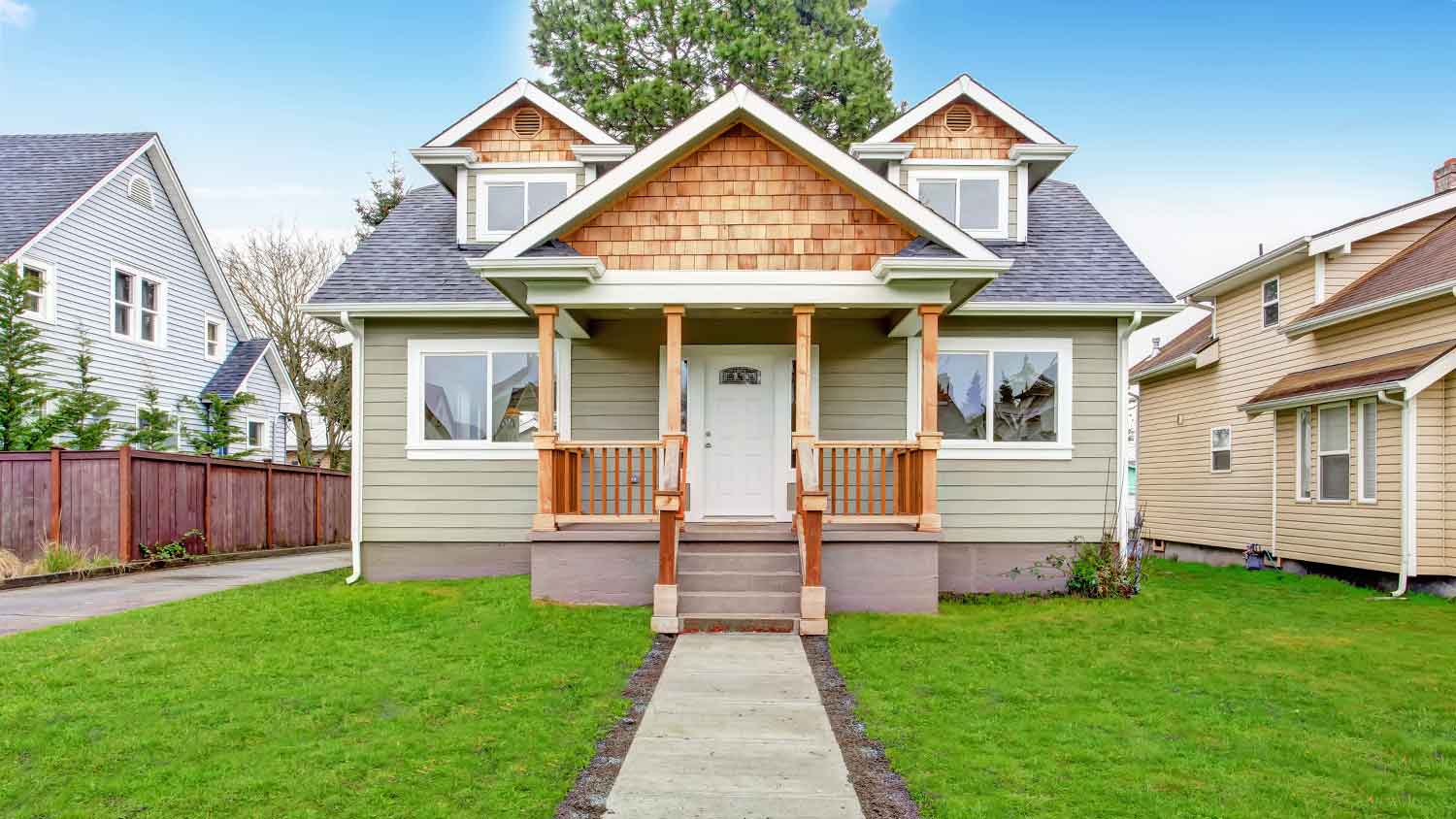 Small house exterior with walkway and porch