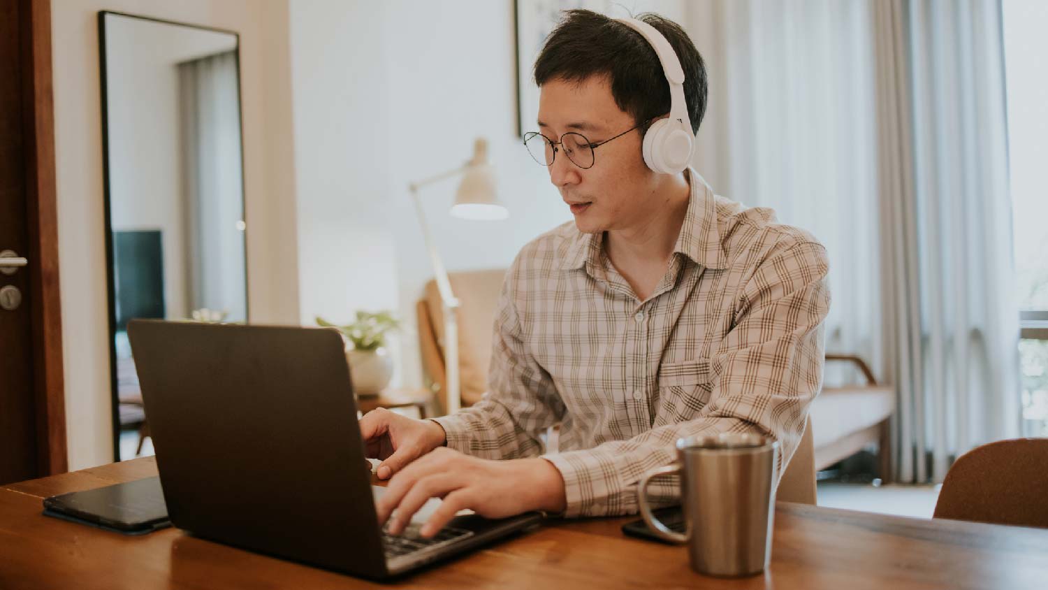 A man working from his home office