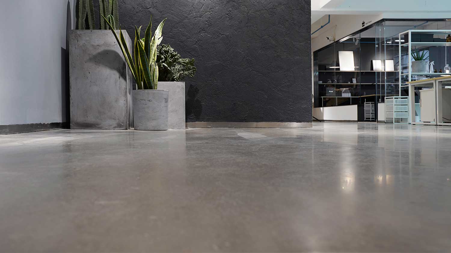 None A view of a room with concrete floors