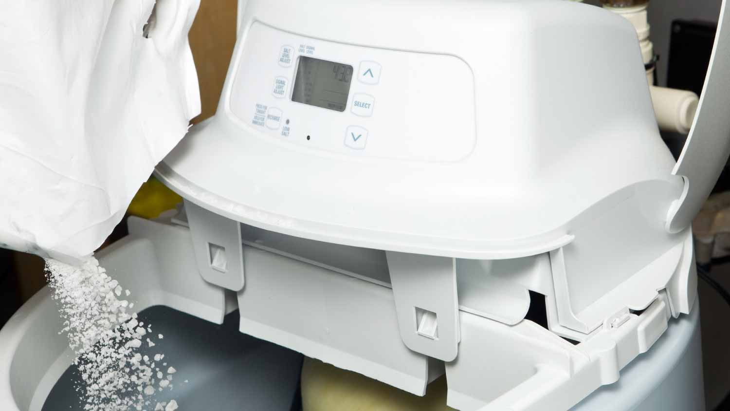 None Man filling water softener