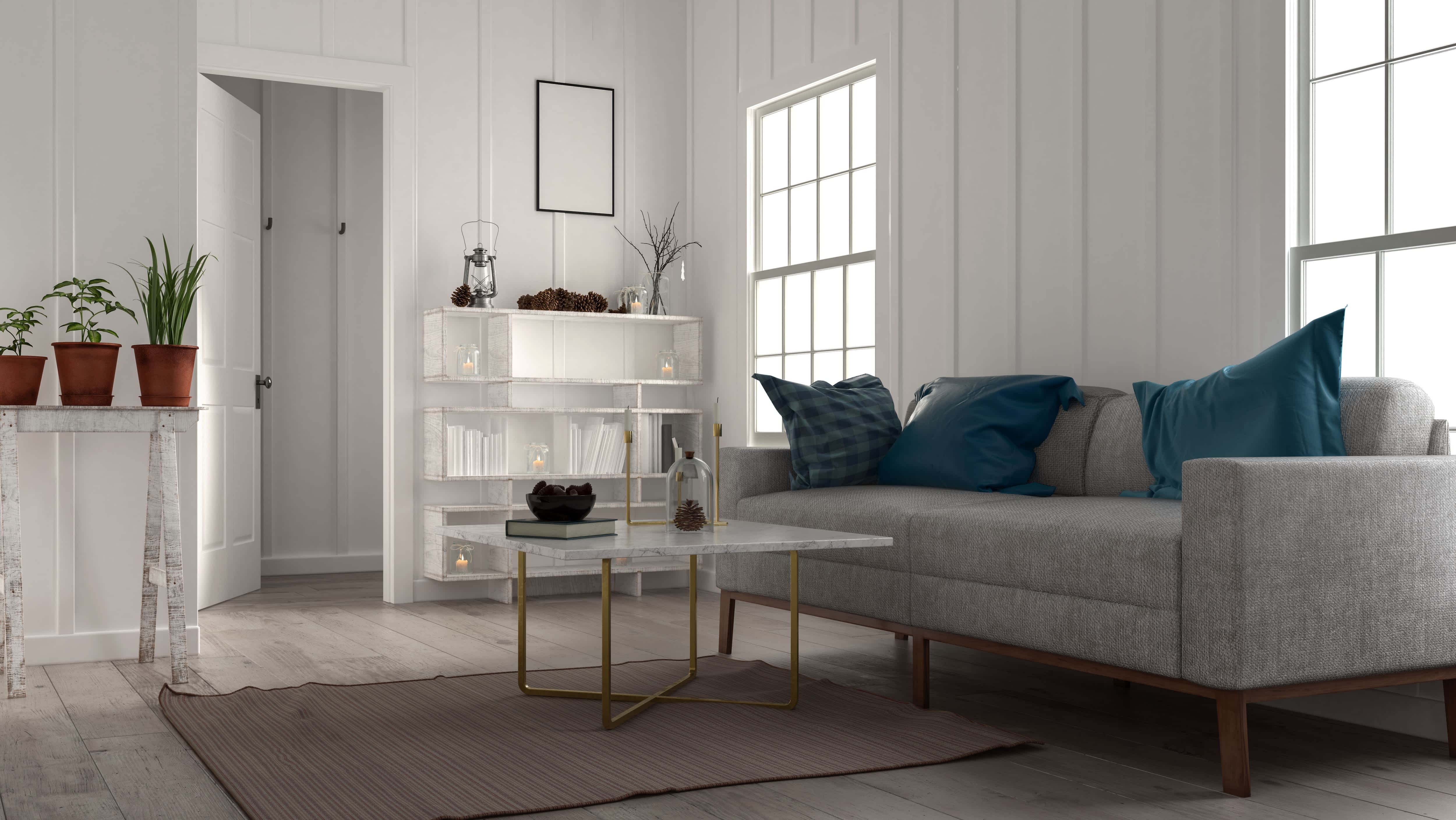 Living room with gray modern furniture and white board and batten walls