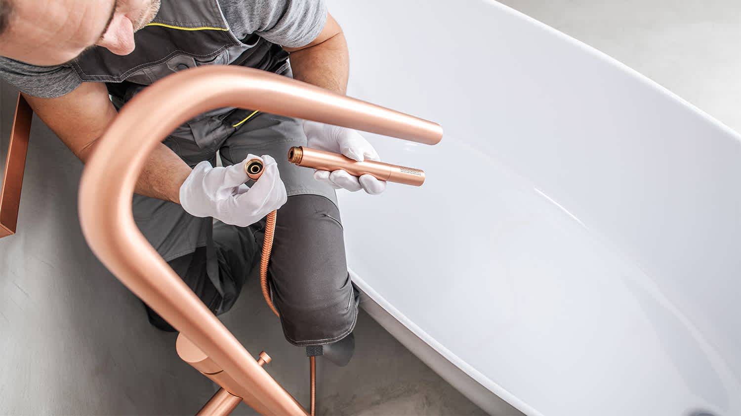 None professional installing new bathtub hardware