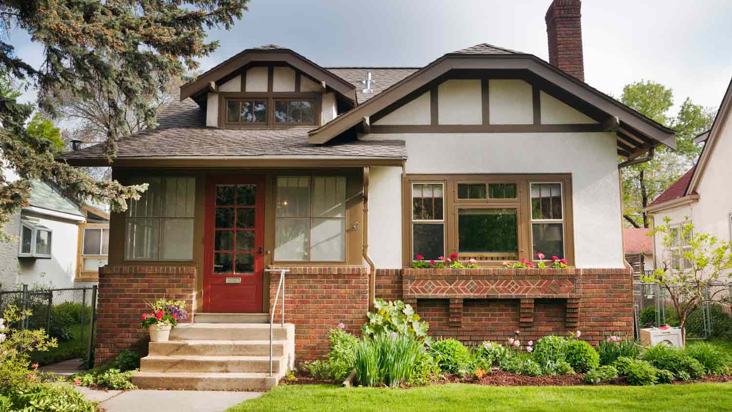 quaint house with concrete steps