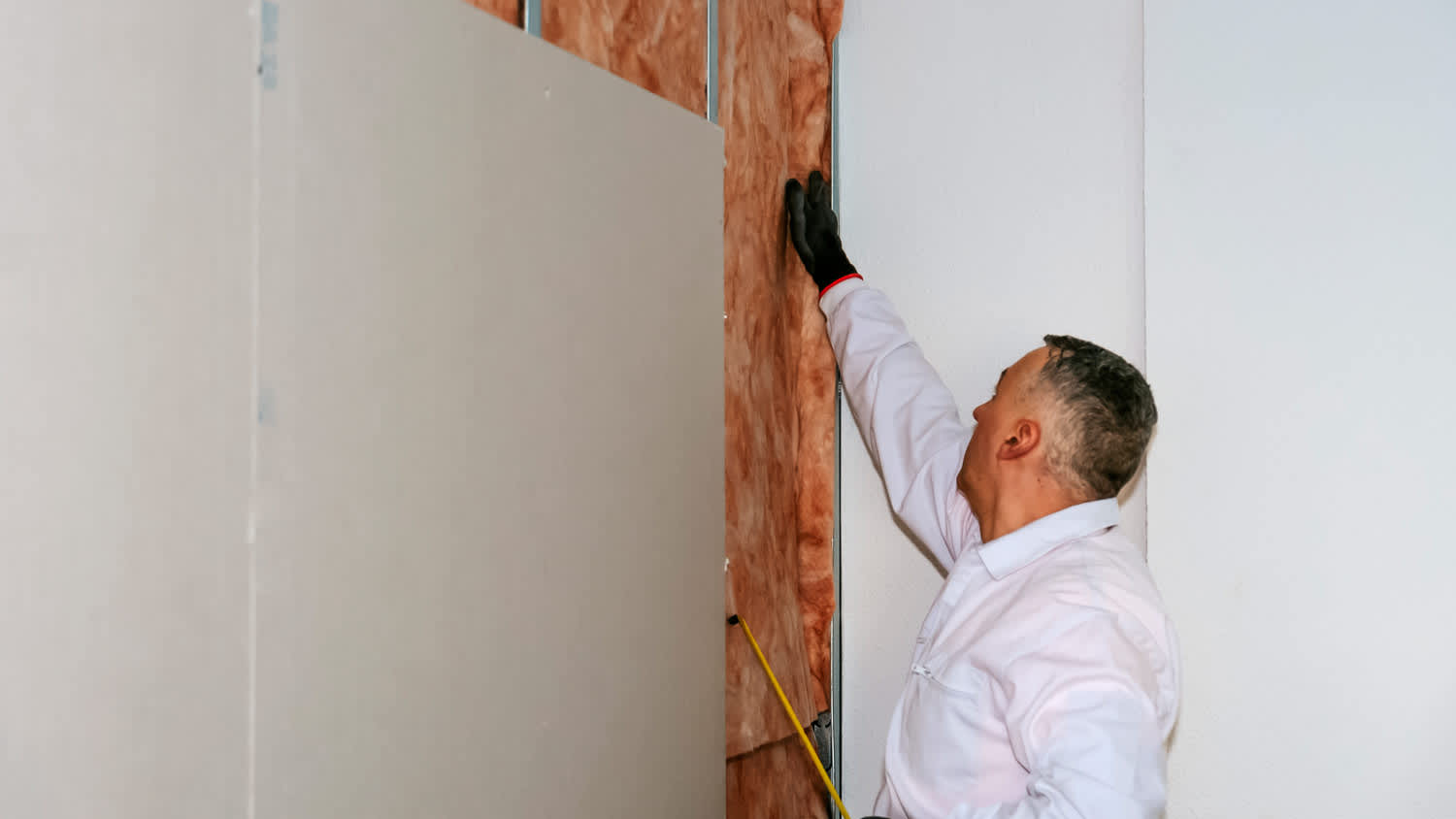 worker soundproofing house