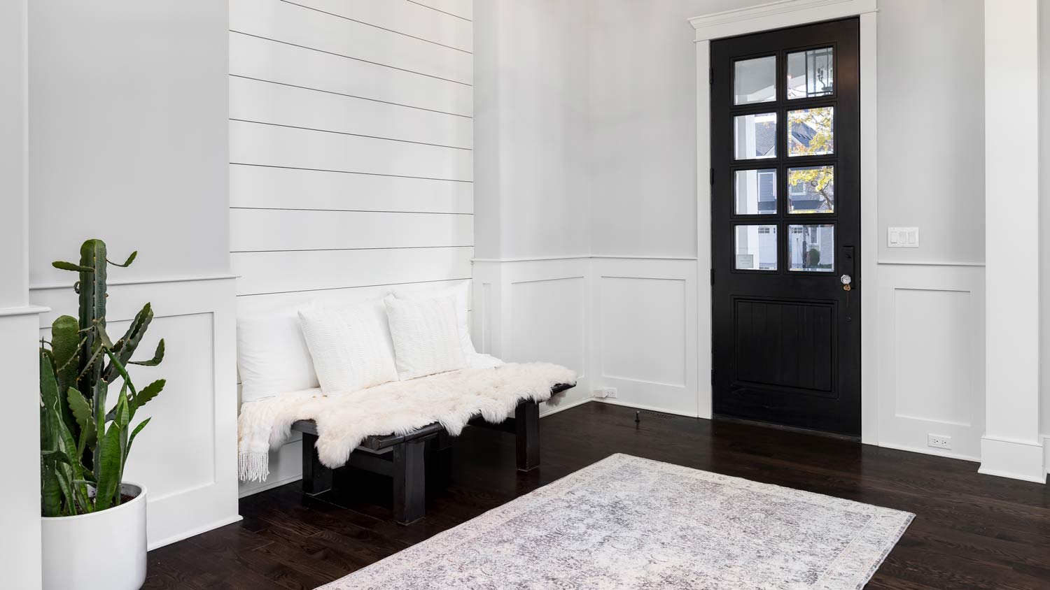 white shiplap entry way
