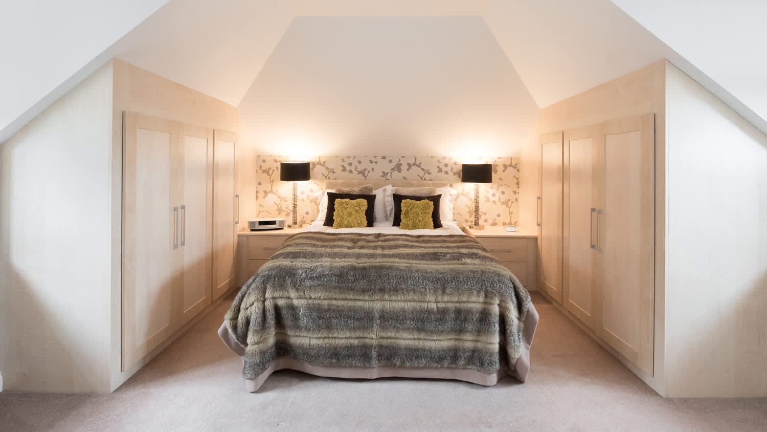 Bedroom with slanted ceiling