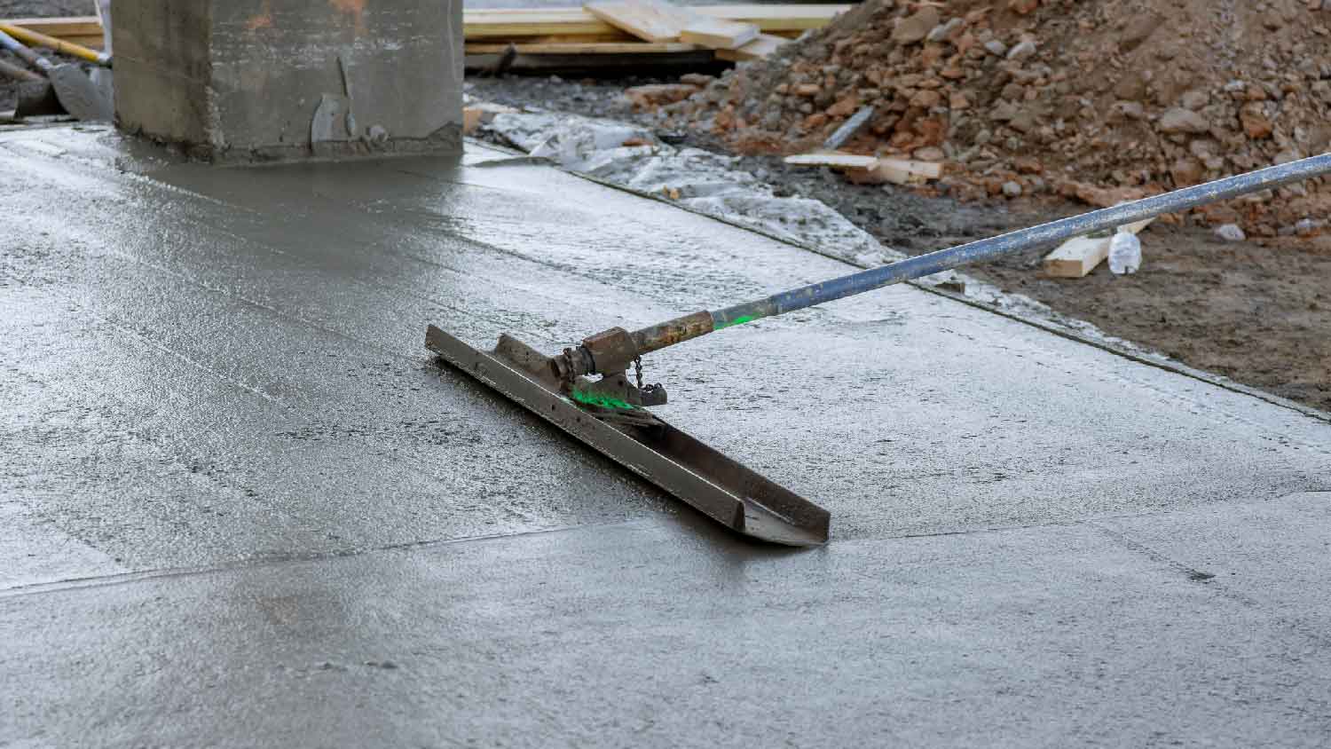 None A man doing concrete resurfacing