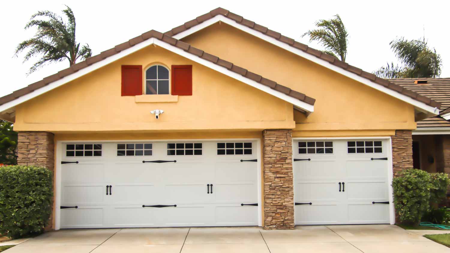 Home exterior with garage doors