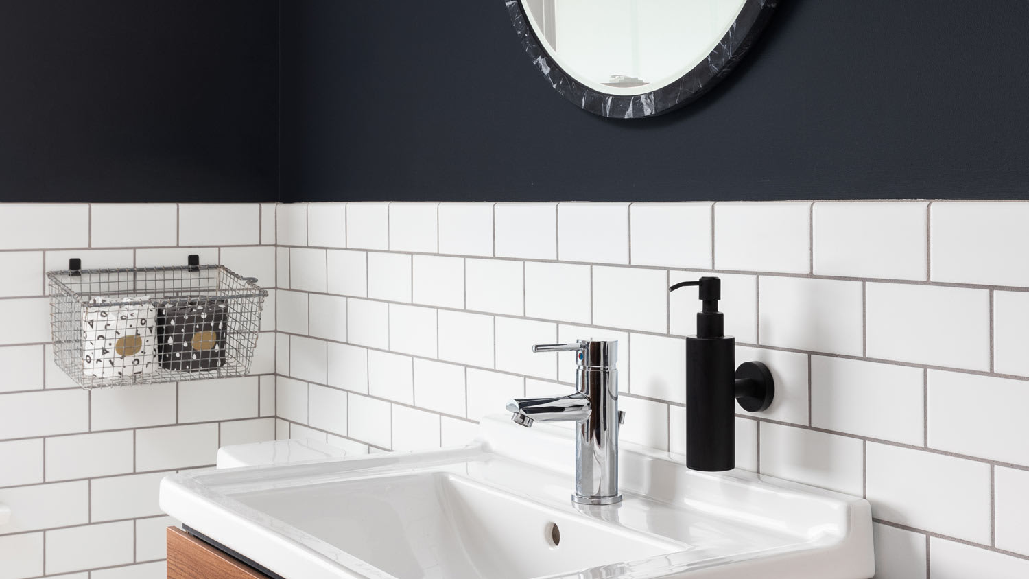bathroom with white subway tiles