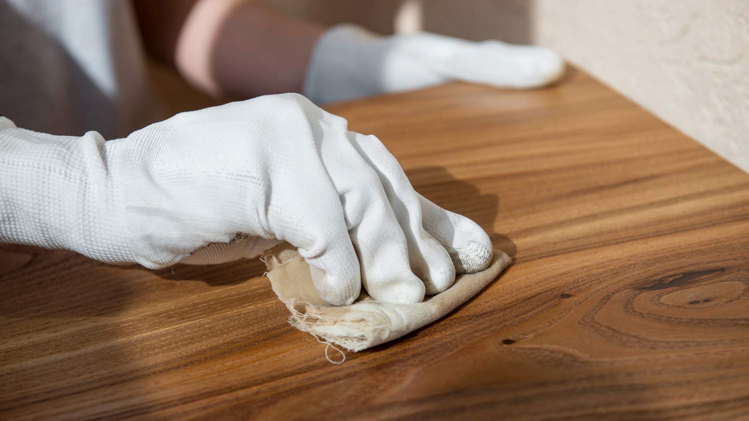 None person using mineral spirit to clean wood furniture