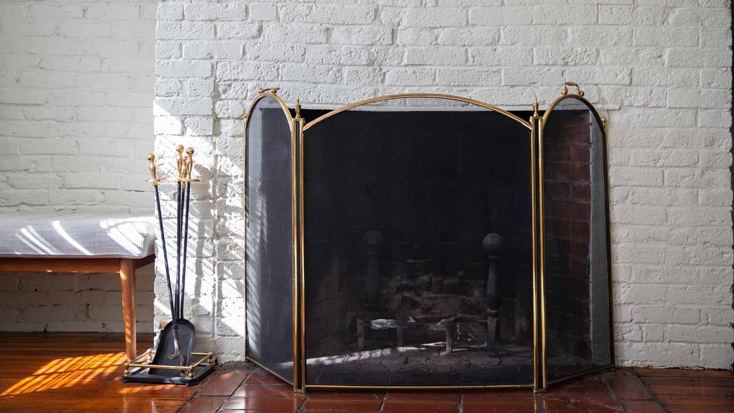 None A black fireplace screen