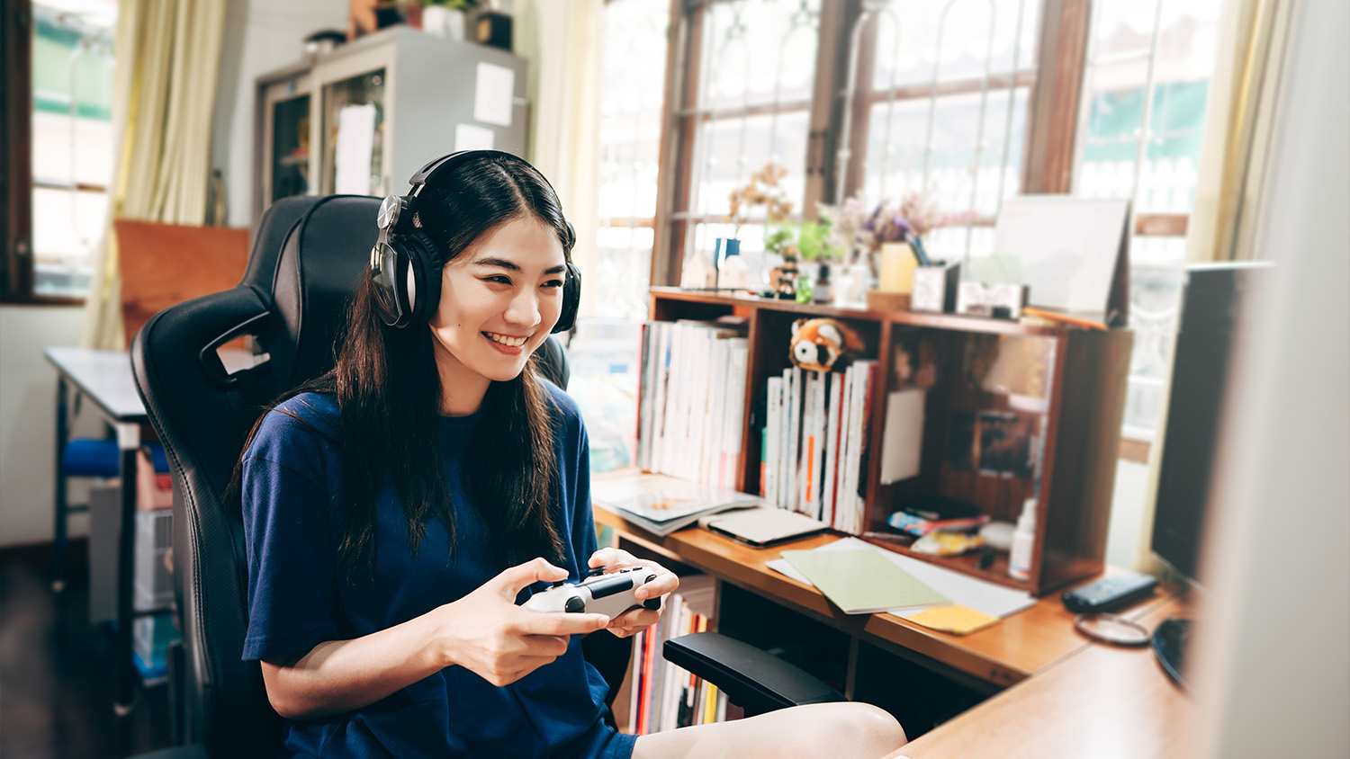 woman in chair playing video game
