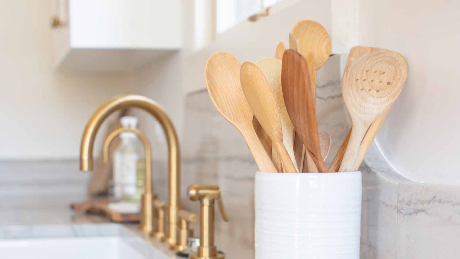 None Wooden spoons in container