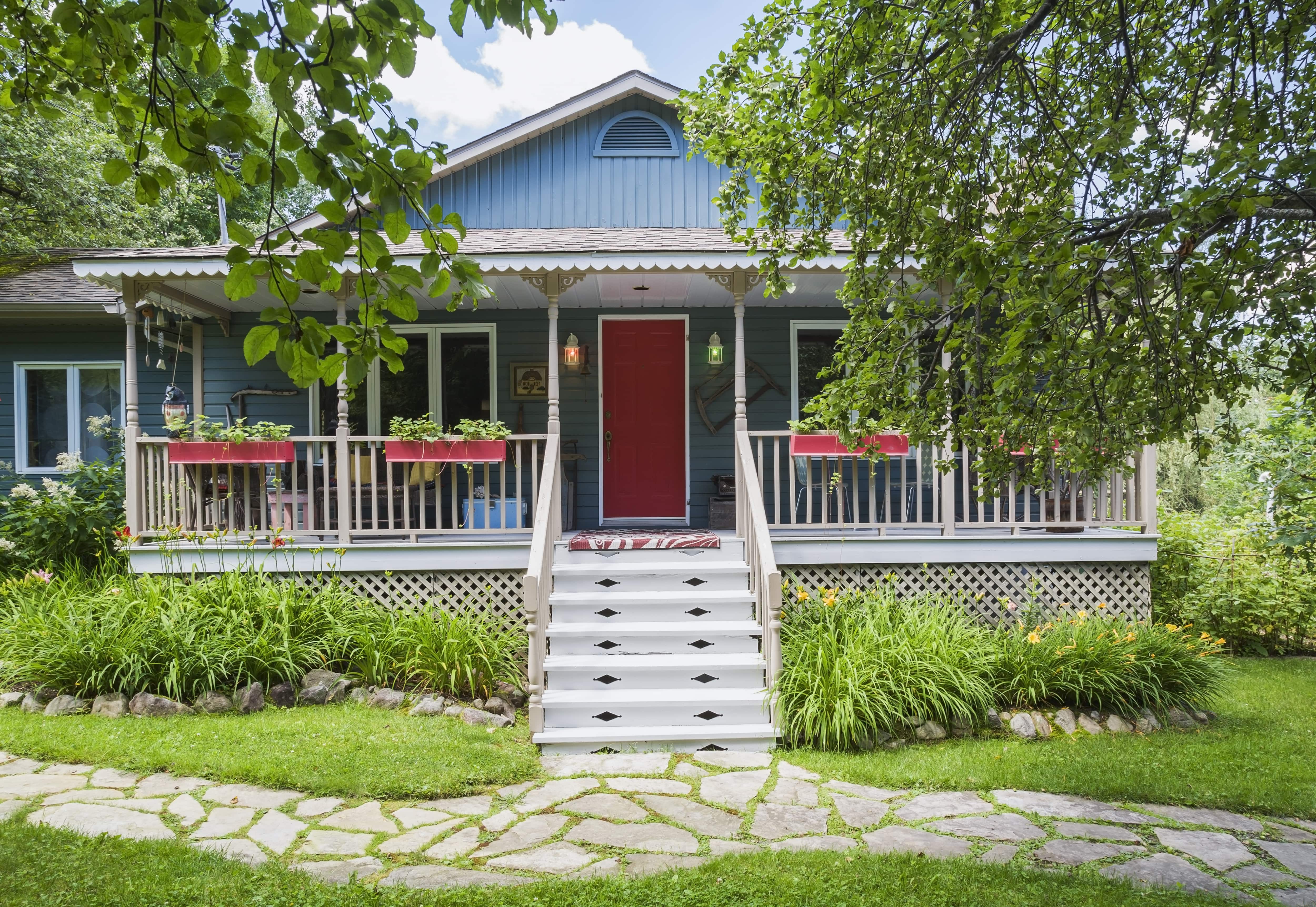 Flower boxes hung on front covered porch