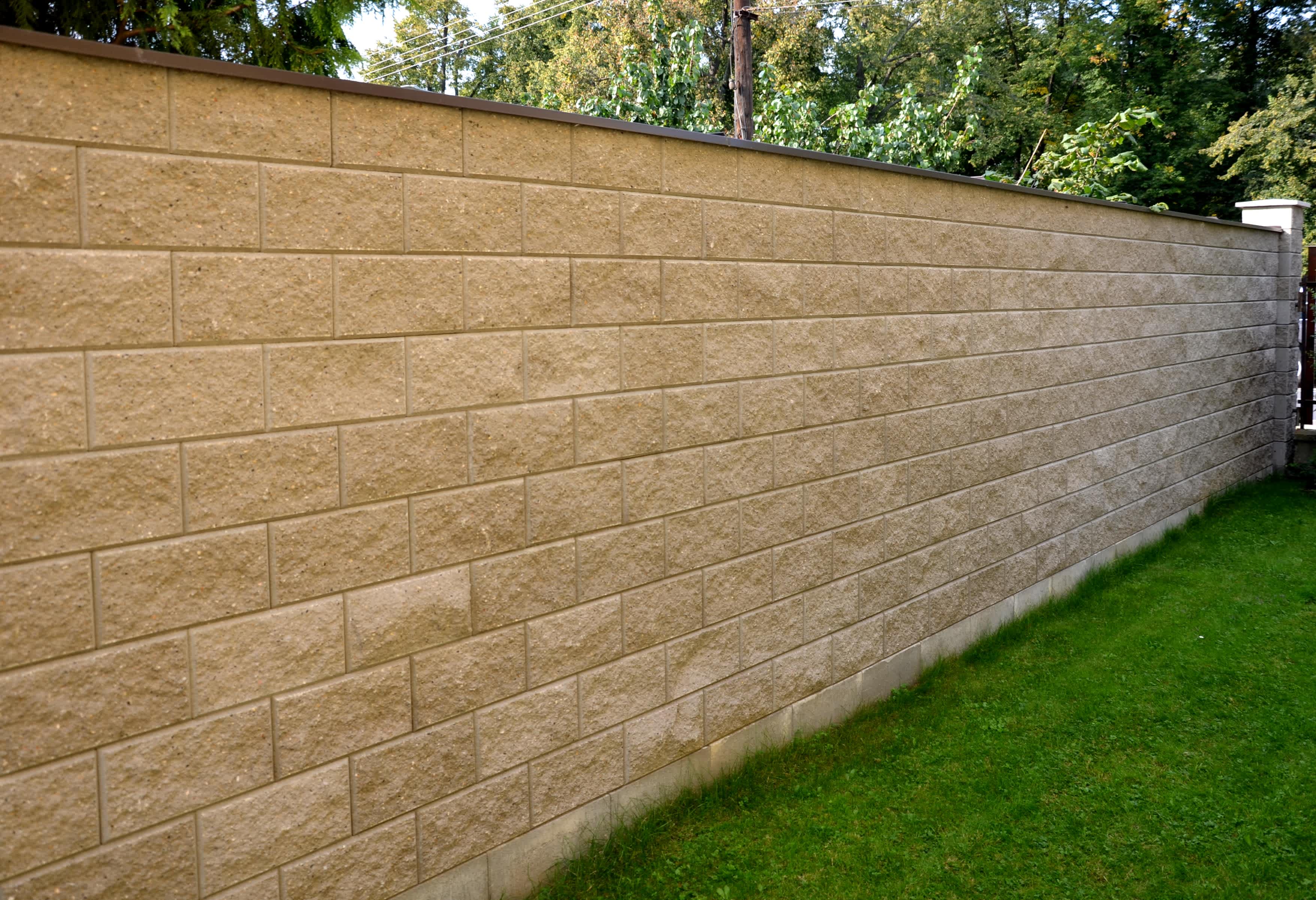 A close-up image of a concrete precast fence