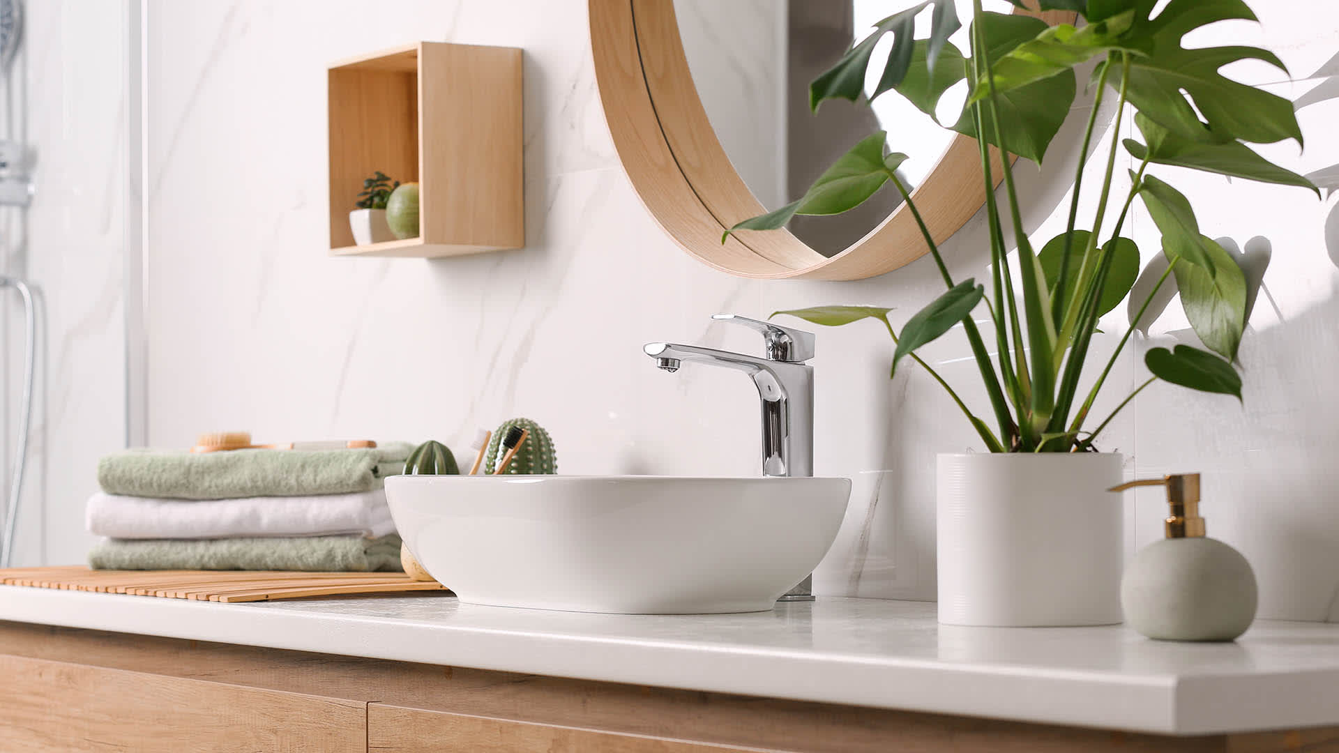 None bathroom sink and counter with plants