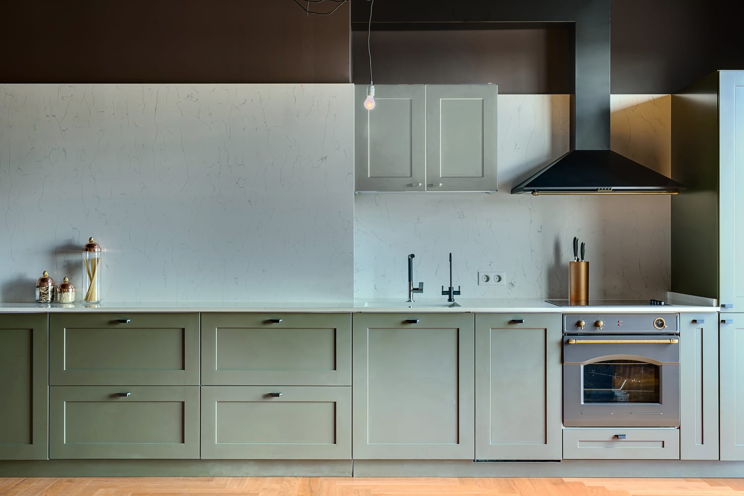 Celadon Green kitchen cabinets by Kitchen Magic.