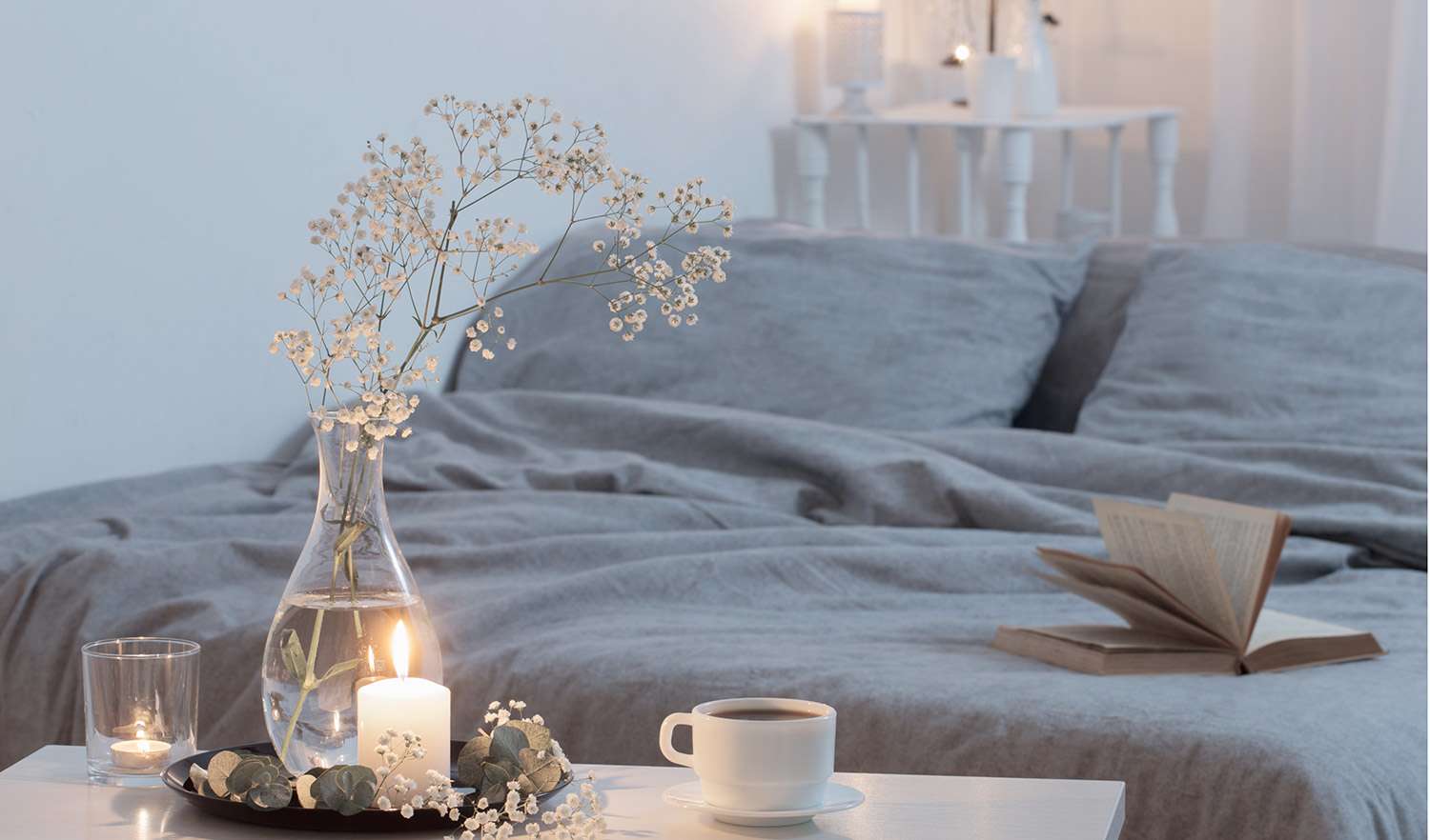 Candles burning in bedroom