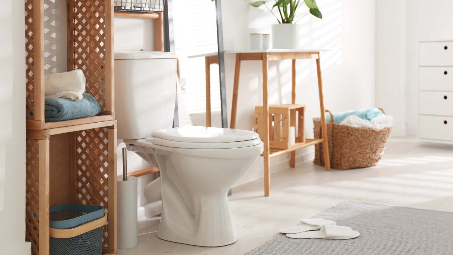 A comfort height toilet in a beautifully decorated bathroom