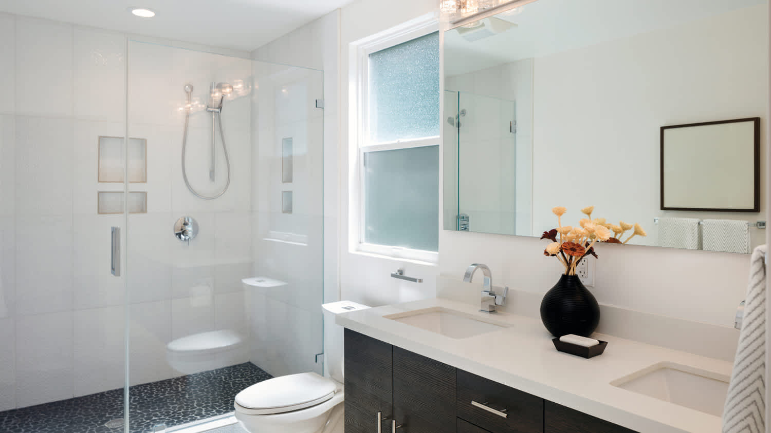 Galss door shower and one sink vanity