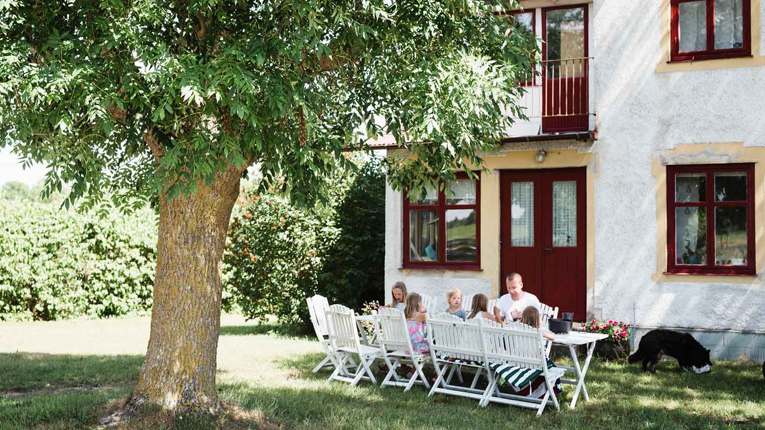 Family having brunch in the garden