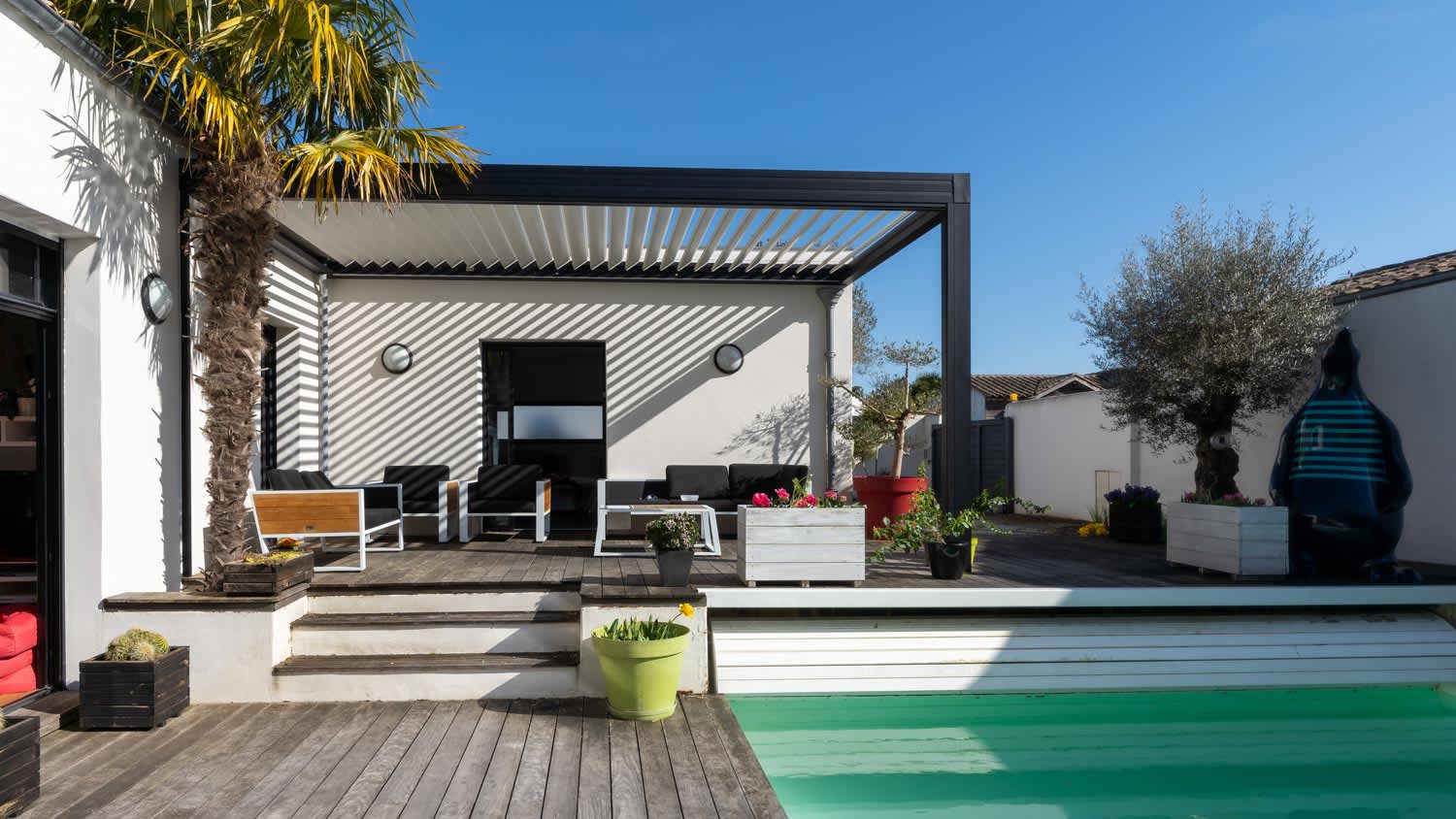 A modern deck with a roof