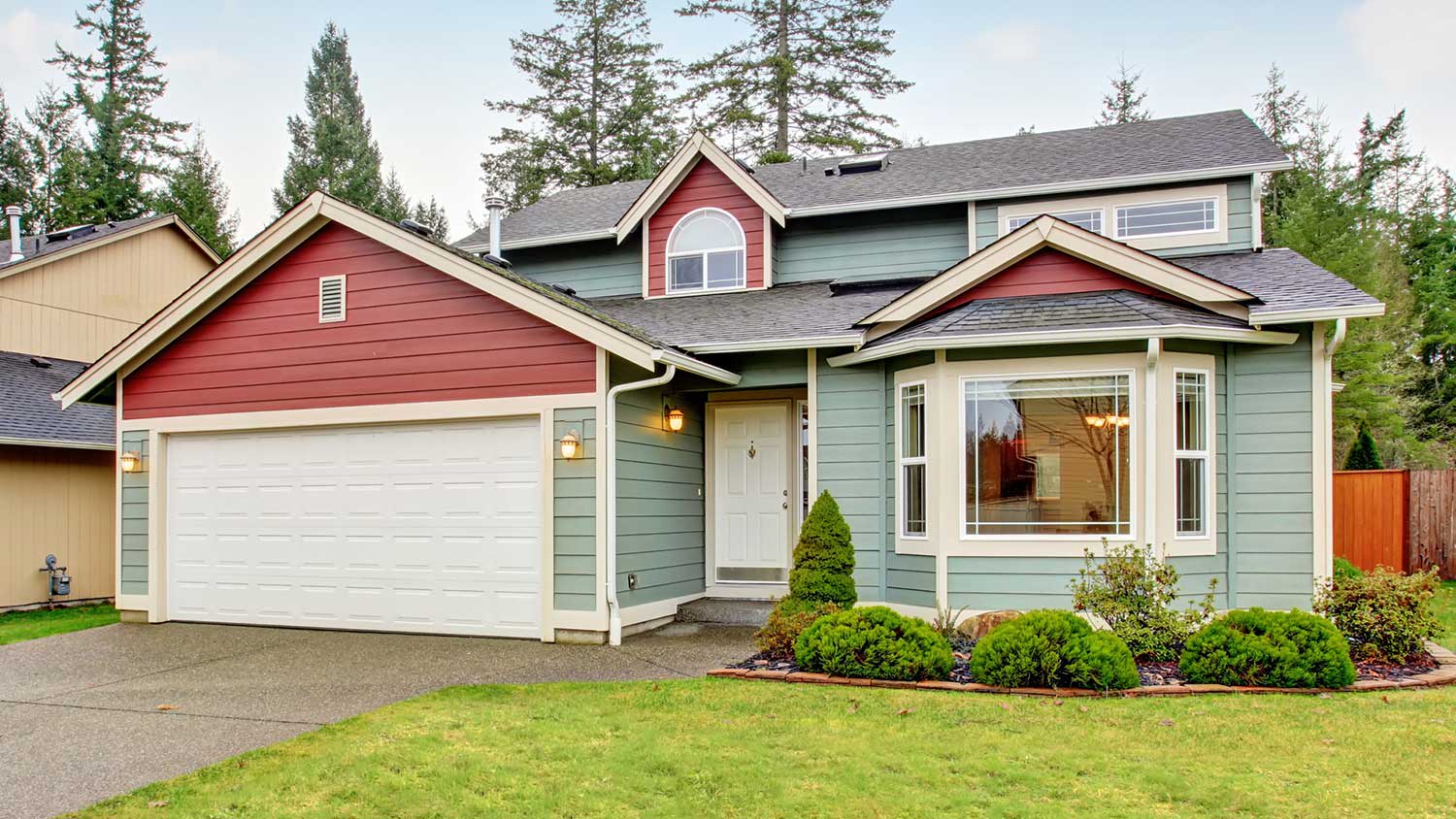 Suburban house with red and green siding