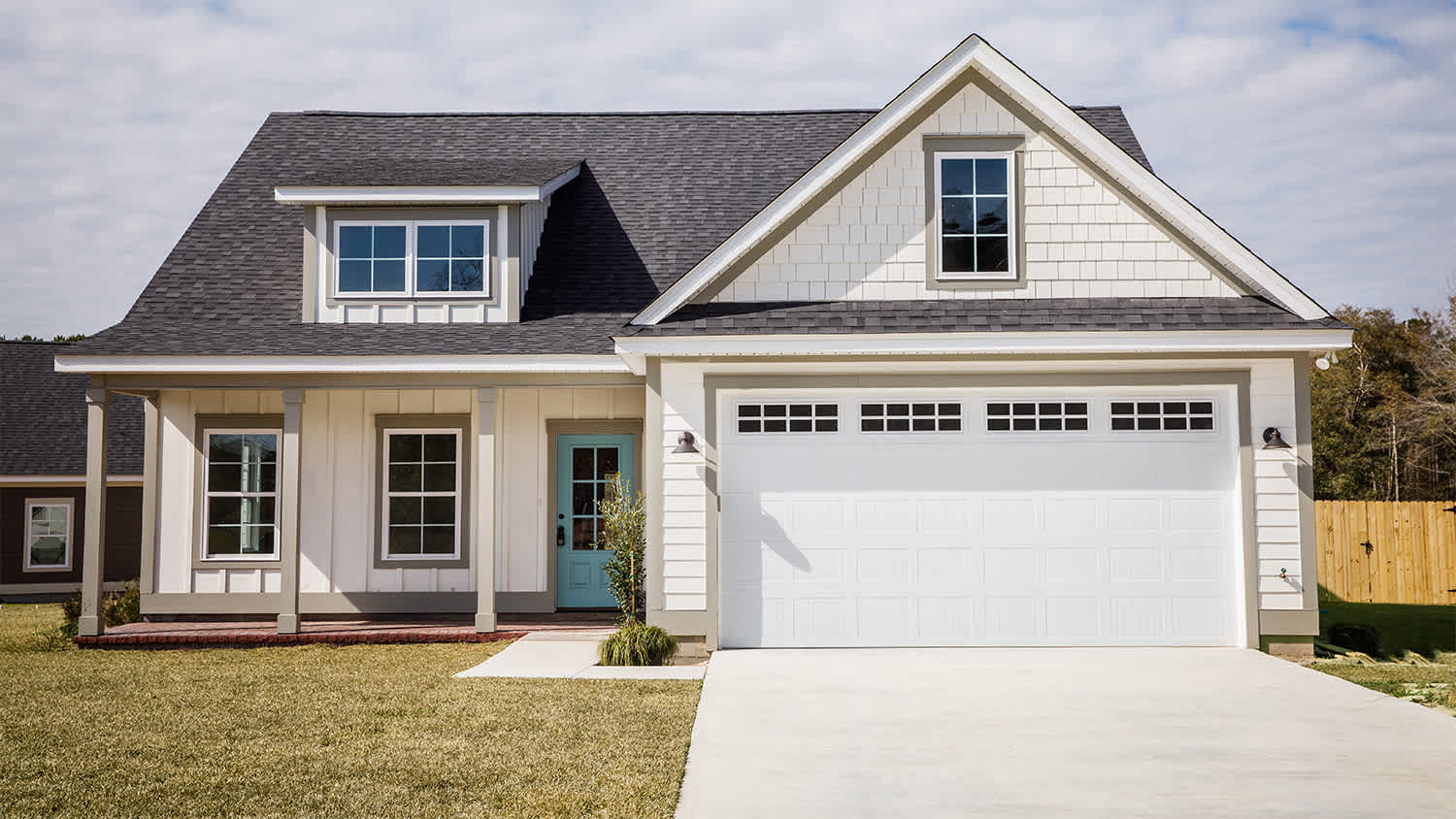 white cottage with grey roof