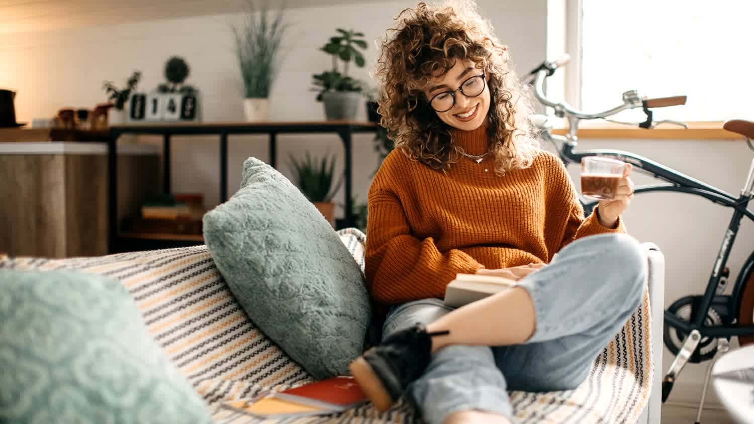 A female student sitting on sofa