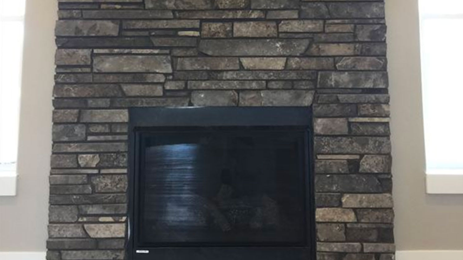 Gray stone fireplace