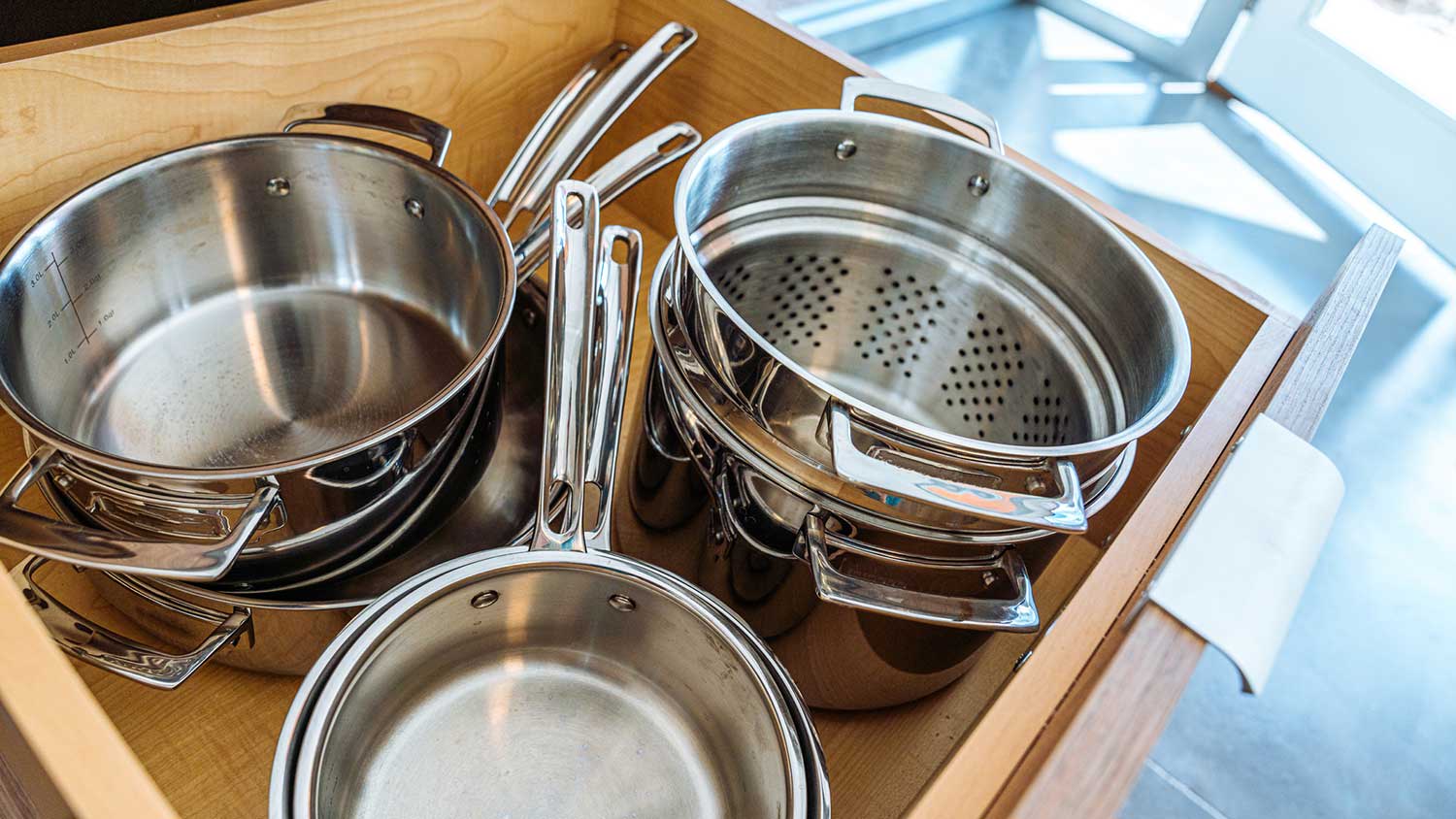Pots and pans in a kitchen drawer